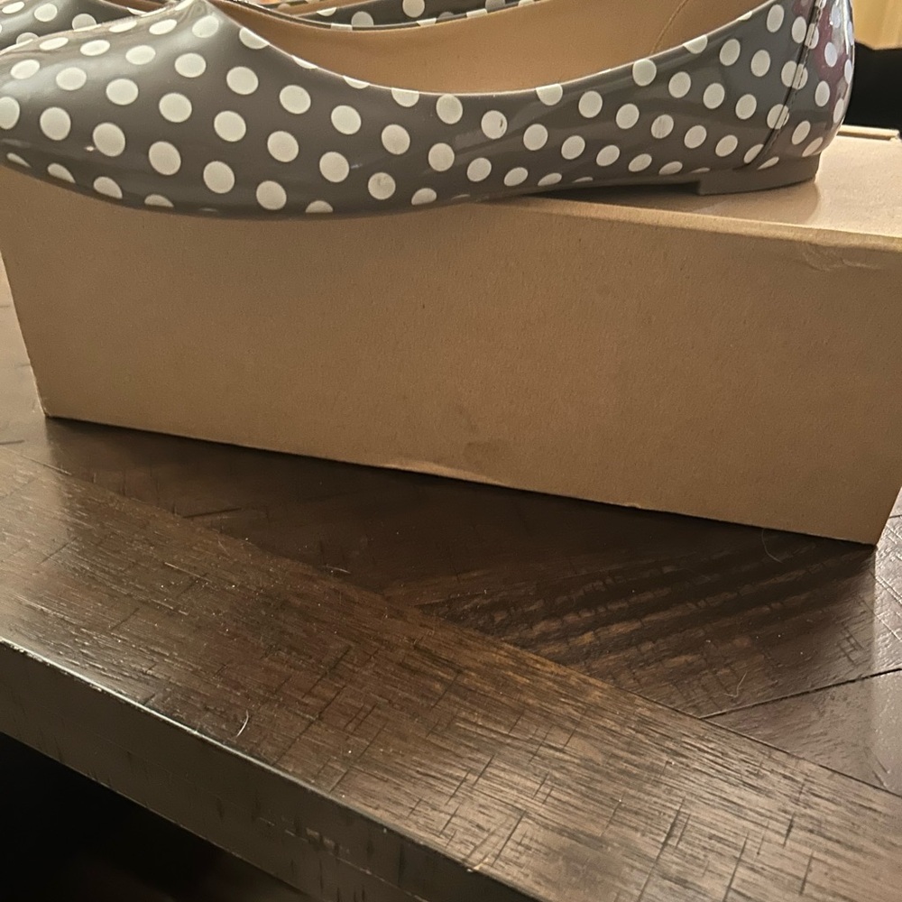 Grey and white polka dot flat